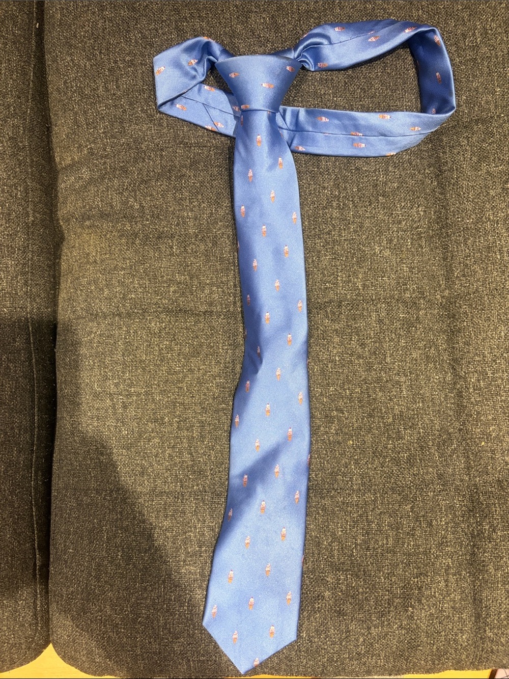 The Tie Bar Blue Silk Tie with Small Pink Motif